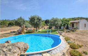 Nice home in Olbia with Outdoor swimming pool, WiFi and 3 Bedrooms